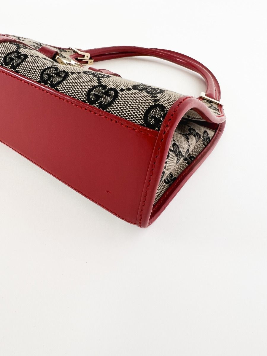 Gucci Vintage Jackie Handbag in GG Canvas and Red Leather | Myzah