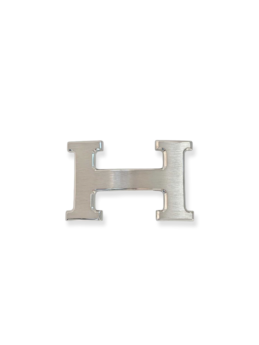 HERMÈS Boucle de ceinture H au carré en métal palladié …