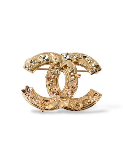 Broche Chanel En Métal Doré Double CC