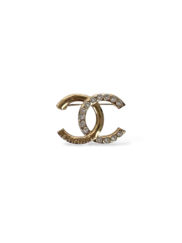 Broche Gold Strass Et Écriture Chanel
